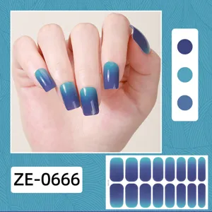 Gradient blue nail wrap sticker detail close-up showing application and sheet design.
