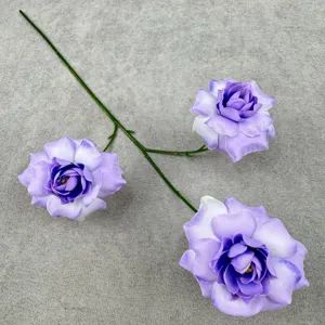 Close-up detail of three-head artificial bubble rose flower branch with purple petals.