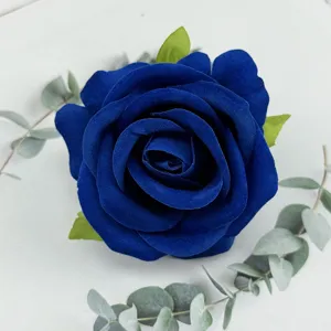 Exquisite blue velvet artificial rose flower head detail for wedding decor and photography props.