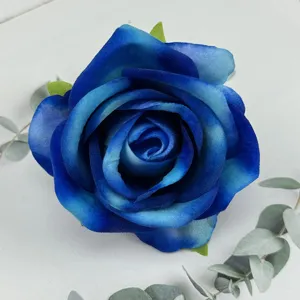 Blue velvet artificial rose flower head detail, perfect for wedding and home decoration.