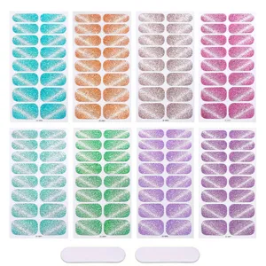 Set di adesivi per unghie occhi di gatto glitterati con colori vivaci e limette.