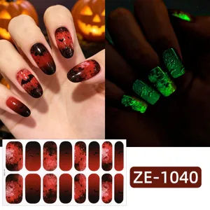 Halloween glowing nail wraps with dark red black gradient bat design for festive party styles.