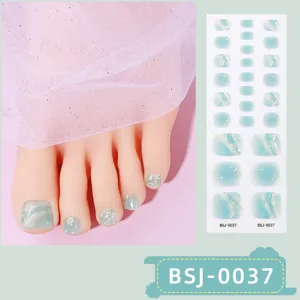Semi-cured gel toenail strips featuring dreamy blue cloud and sparkling star 3D nail art design.
