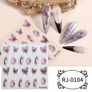 Detail view of 5D embossed butterfly nail stickers, pink gemstone decals for gorgeous nail art.