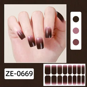 Gradient brown nail wrap detail showing glossy finish and smooth transition effect.