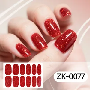 Close-up of red glitter full-wrap nail stickers on fingers with product sheet detail.