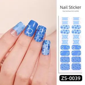 Blue floral nail stickers close up, double row full cover manicure wrap for stylish fingers.