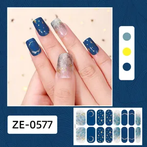 Pegatinas de uñas cielo estrellado con luna y estrellas doradas, envolturas degradadas.