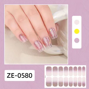 Pegatinas de uñas con purpurina degradada y detalles de lámina de oro, manicura francesa elegante.