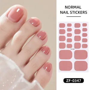 Gedetailleerd overzicht van effen teennagelstickers met gladde roze afwerking en vel.