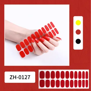 Vista detallada de pegatinas de uñas rojas sólidas con acabado brillante y opciones de tamaño.