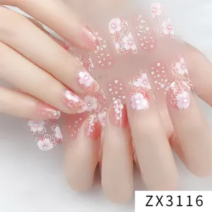 Detail view of Korean style cherry blossom nail stickers with rhinestones for cute girls.