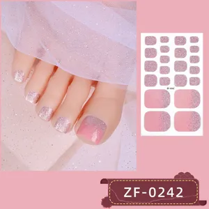 Detailed view of pink glitter gradient toe nail stickers, perfect for charming pedicure art.