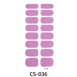 Purple glitter nail stickers detail view, shimmering nail wraps for stunning manicure design.