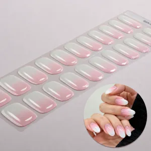 Vista dettagliata delle strisce per unghie in gel sfumate rosa e bianche senza lampada.