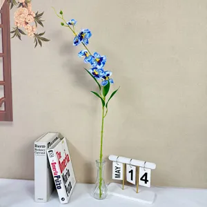 Artificial blue orchid flower arrangement home decor silk floral stem in glass vase for table.