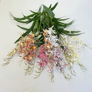 Detailed close-up of artificial spider orchids and dendrobium flower bundles with vibrant colors.