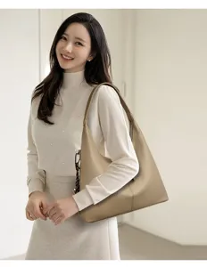 Elegant genuine leather shoulder bag for women, large capacity hobo tote for daily commute.