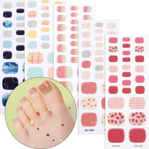 Semi-cured gel toe nail strips set with various gradient, plaid and cute styles for pedicure art.
