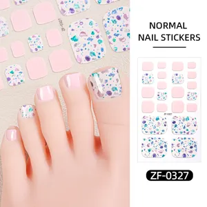 Detailed close-up of summer pink and colorful crushed stone pattern toe nail stickers.