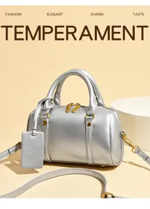 Silver metallic small Boston bag PU leather chic pillow handbag with shoulder strap.