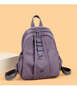 Sac à dos décontracté violet imperméable pour femmes, cartable stylé avec anneau.