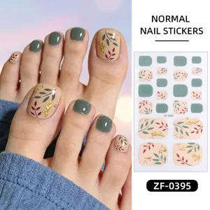 Green and beige leaf toe nail stickers with gold foil design cute and bright style.
