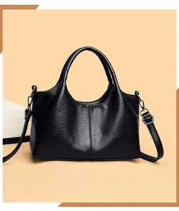 Borsa a mano in pelle nera da donna, versatile shopper grande con tracolla e manici.