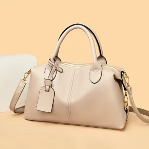 Sac à main Boston en cuir beige motif litchi classique, élégant sac bandoulière femme.
