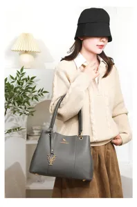 Stylish grey pu leather tote handbag with elegant pendant for women commuting everyday use fashion