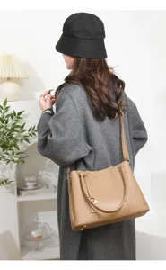 Cross-body shoulder handbag with chic lychee pattern design, versatile commuting bag for women.