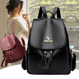 Women's PU leather backpack with tassel decoration, stylish casual school bag for daily use.