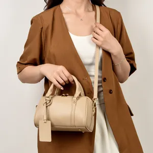 Chic solid color leather small boston bag, stylish daily crossbody handbag for women.