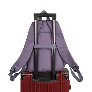Sac à dos de voyage violet imperméable avec sangle de valise pour extérieur et quotidien.