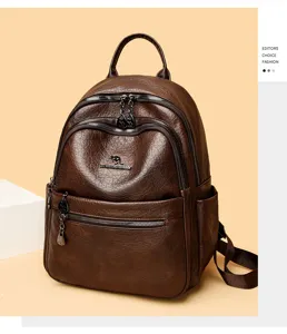 Vintage brown leather backpack for women, retro oil wax travel rucksack with multiple zip pockets.