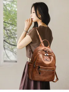 Vintage oil wax leather backpack for women, multi-pocket travel school bag, casual daily daypack.