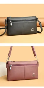 Borsa a tracolla doppia busta in vera pelle con tasche multiple e finiture metalliche.