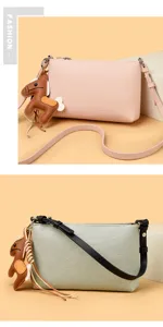 Schicke Leder Umhängetasche für Handys mit süßem Pferdeanhänger und elegantem Design.