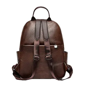 Vintage brown oil wax leather backpack for women, retro casual travel school daypack bag.