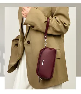 Stylish cowhide pattern leather cell phone bag and clutch with silver bar for women daily wear