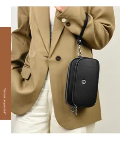 Black leather multi-layer phone bag with wrist strap, chic minimalist womens bag.