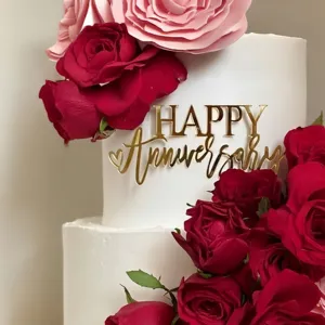 Gold acrylic Happy Anniversary cake topper for wedding anniversary party dessert table decorations.