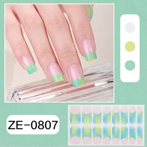 French gradient nail wraps detail showing beautiful green blue manicure on hand and full sticker sheet