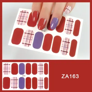 Plaid and solid color nail wraps detail view, stylish pink and purple design for manicure.