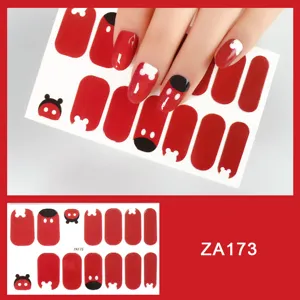 Detailed view of red Mickey mouse nail art stickers, showcasing close-up design patterns.