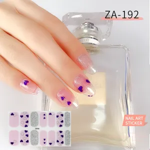 Detailed view of purple heart and silver glitter nail art stickers, elegant design.