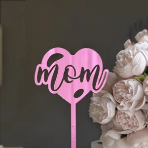 Pink mirror acrylic cake topper with mom text design for Mother's Day party dessert decoration.