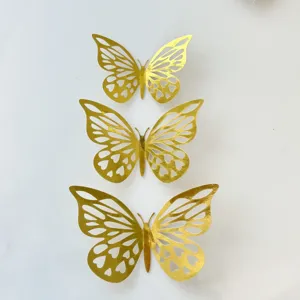 Gold hollow paper butterfly cake topper detail view, elegant party decoration, 3pcs set.