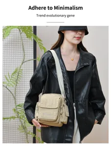 Canvas crossbody bag with multi pockets casual outdoor shoulder bag neutral style daily use.