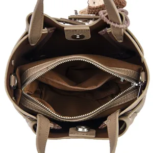 Top view of stylish leather bucket bag with inner zipper pouch and metal lock for women.